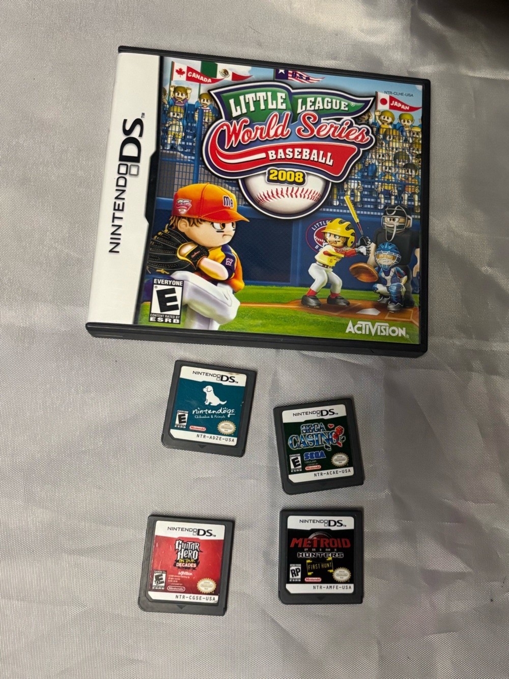 Nintendo ds games Lot. Metroid, Guitar Hero, Sega Casino, Nintendogs, Baseball
